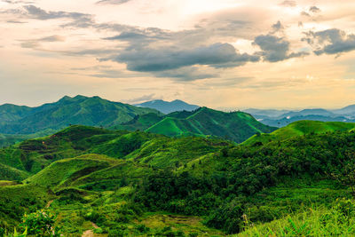 Scenic view of mountains against sky during sunset