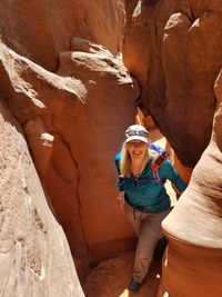 Woman standing on rock