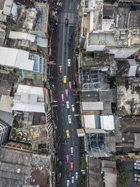 Aerial view of street amidst buildings in city