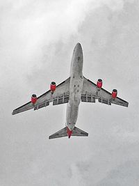 Low angle view of airplane in sky