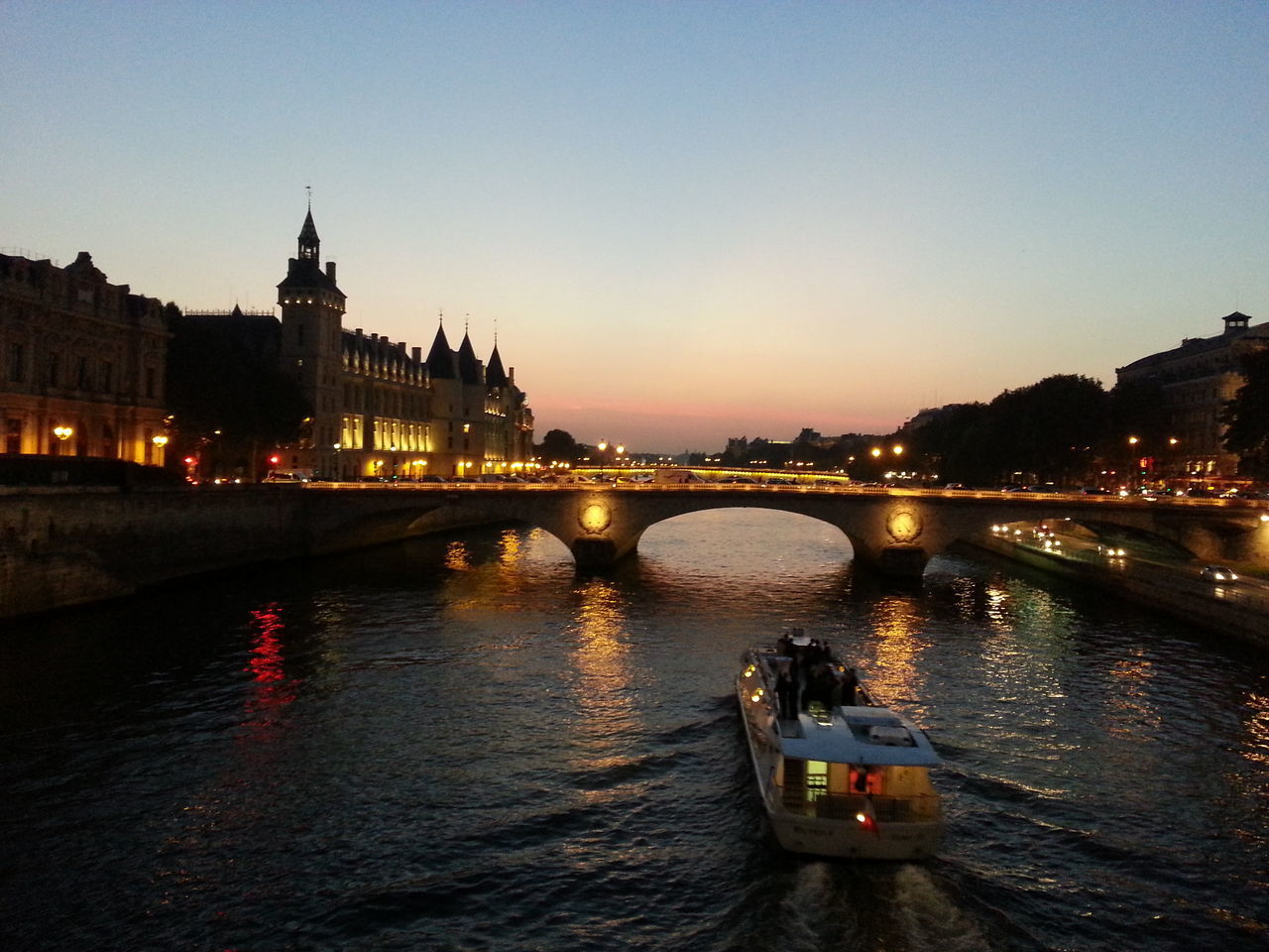 BRIDGE OVER RIVER AT NIGHT