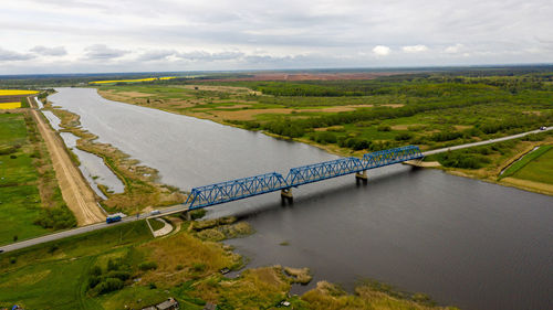 Aerial panoramic view from above to the bridge over the river lielupe near kalnciems, latvia