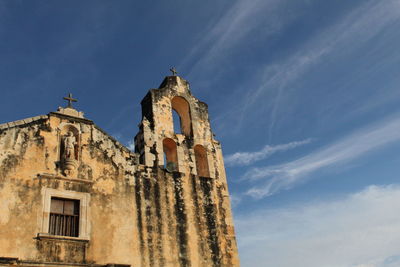 Low angle view of old building against sky