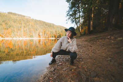 Full length of young man in forest