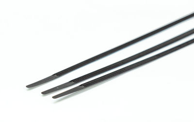 High angle view of colored pencils on white background