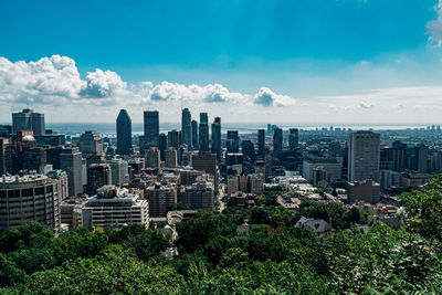 Buildings in city against sky