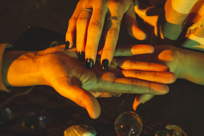 Palm reading - fortune and future teller - palmistry fortune teller reads lines on man hand 