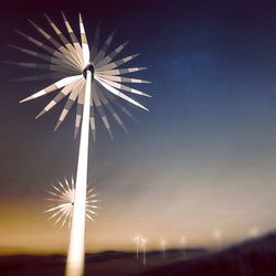 Low angle view of windmill against clear sky