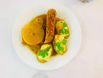 High angle view of fruits in plate on table