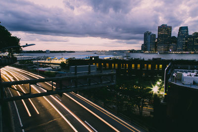 High angle view of illuminated cityscape against sky