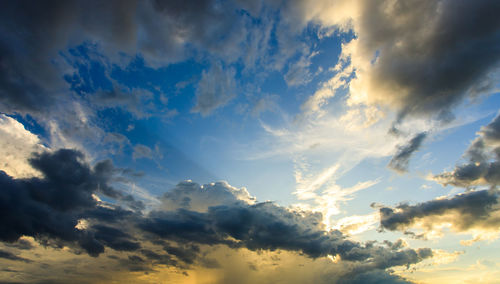 Low angle view of clouds in sky during sunset