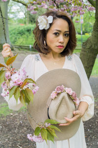 Woman holding flower bouquet