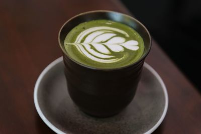 Close-up of coffee cup on table