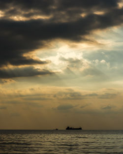 Scenic view of sea against sky at sunset