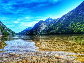 Surface level of lake against sky