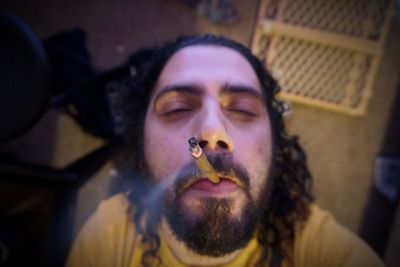 Portrait of man smoking