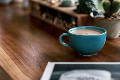 Close-up of coffee cup on table