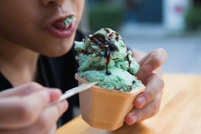 Close-up of boy eating ice cream