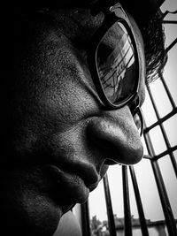 Close-up portrait of man wearing sunglasses