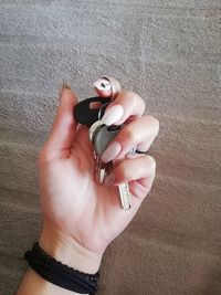 High angle view of woman hand