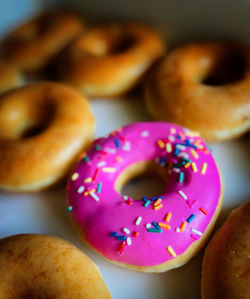 Close-up of donuts on table