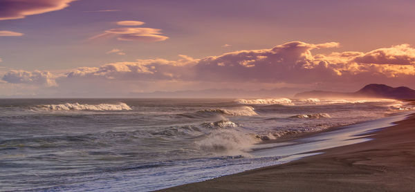 Views of pacific ocean coast in kamchatka on red sunset