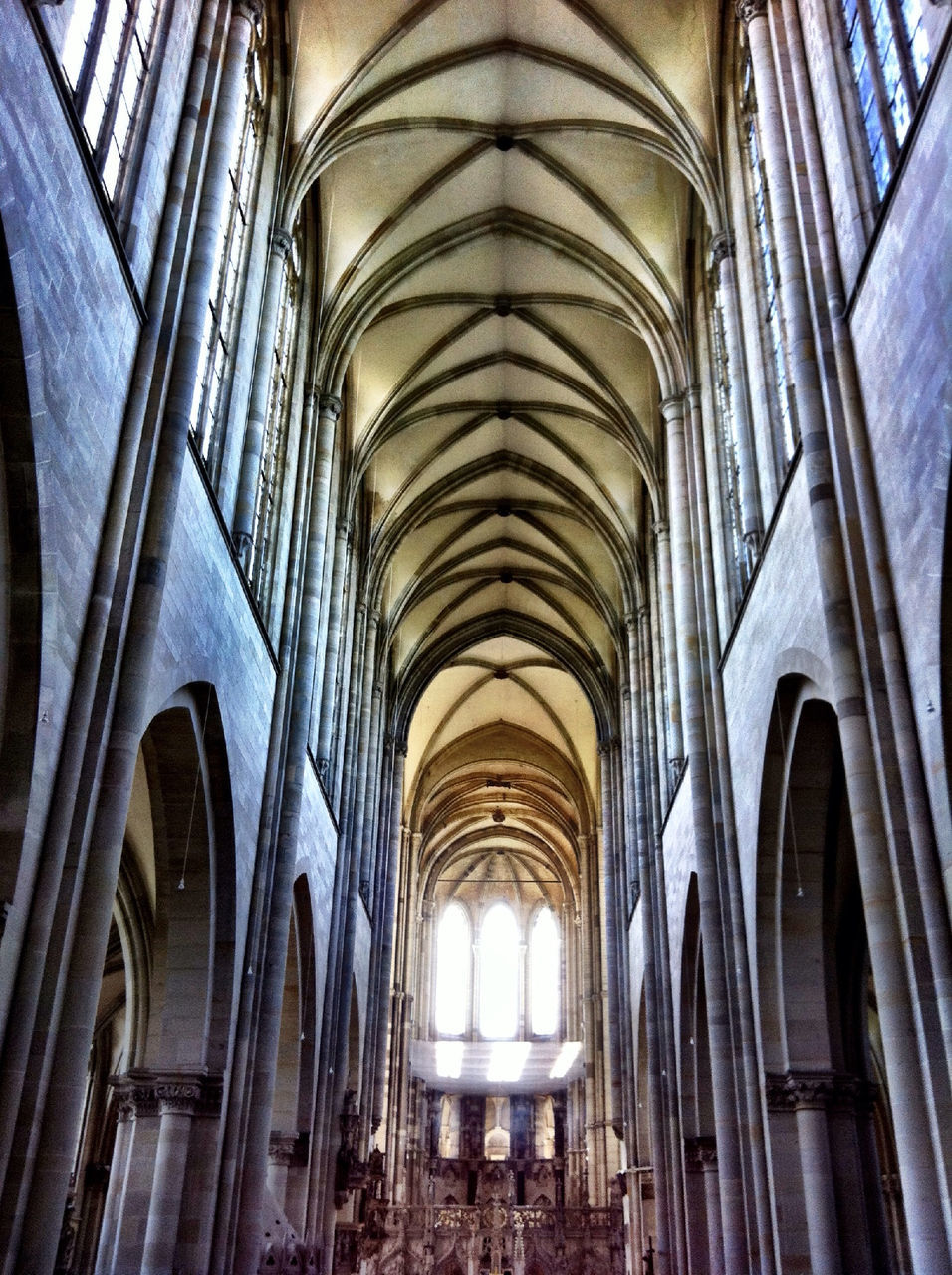 indoors, arch, ceiling, architecture, interior, built structure, church, place of worship, low angle view, religion, architectural column, spirituality, history, window, old, corridor, architectural feature, cathedral