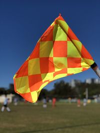 Multi colored umbrella against the sky