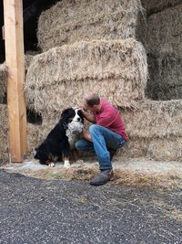 Full length of man with dog