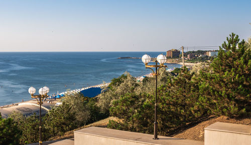 Panoramic view of the public beach in chernomorsk city on a sunny summer morning