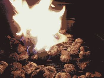 High angle view of bonfire on display at night