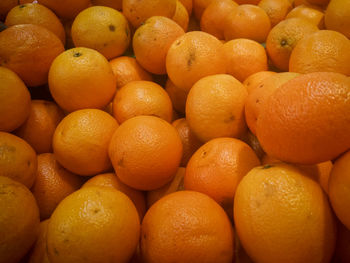 Full frame shot of oranges at market stall