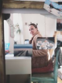 Portrait of woman standing in store