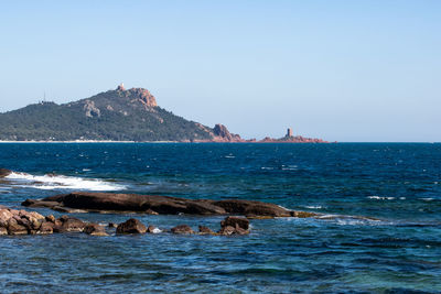 Scenic view of sea against clear sky