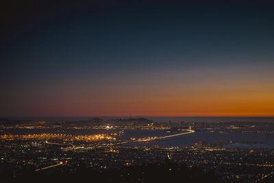 Aerial view of illuminated cityscape