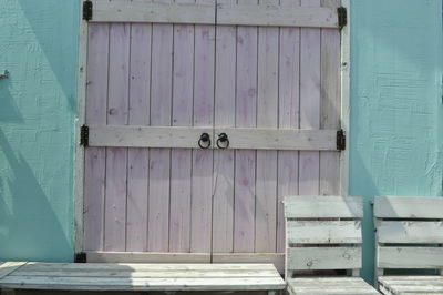 Closed wooden door of building