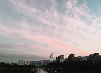 Cityscape against sky during sunset