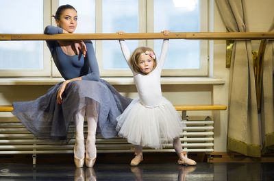 Little ballerina in ballet class