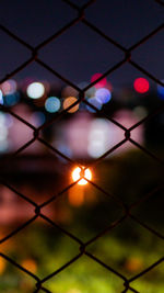 Full frame shot of illuminated chainlink fence