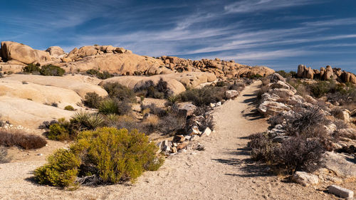 Panoramic view of rock formations against sky