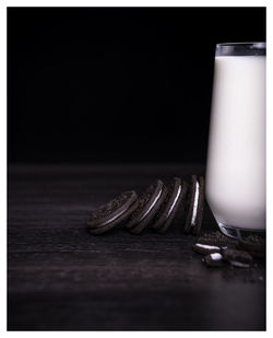 Close-up of food on table against black background