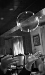 Cropped image of person holding music