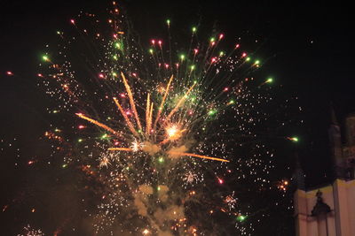 Firework display at night