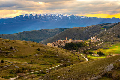 Scenic view of mountains against sky during sunset