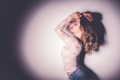 Portrait of young woman looking away