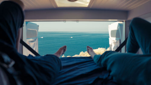Laying in the van enjoying the view.