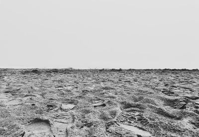 Scenic view of beach against clear sky