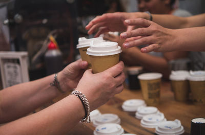 Close-up of cropped hand holding ice cream