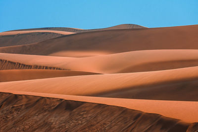 View of desert against clear sky