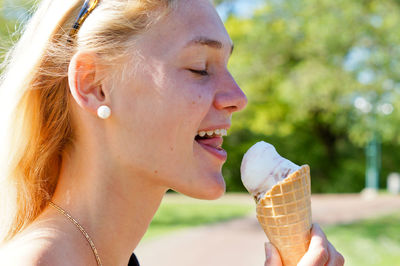 Close-up of woman holding ice cream